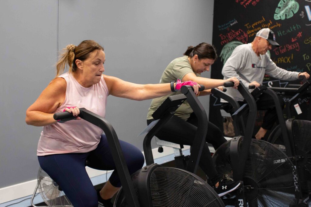 55 and older members resistance training at Coastal Fitness