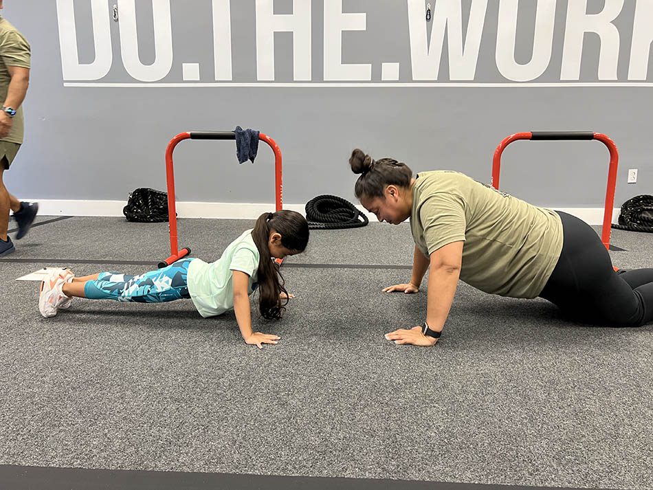 Mother/daughter duo work on completing the Murph together