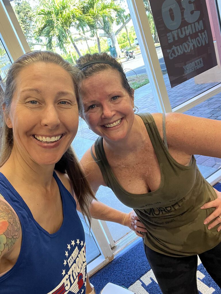 Members of Coastal Fitness posing for photo after a tough workout.