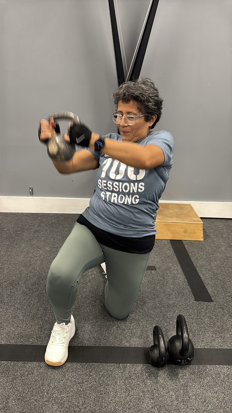 A 55 and older member strength training at Coastal Fitness