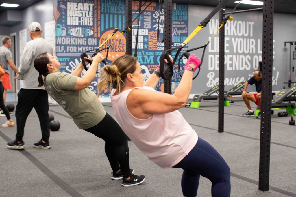 55 and older members strength training at Coastal Fitness
