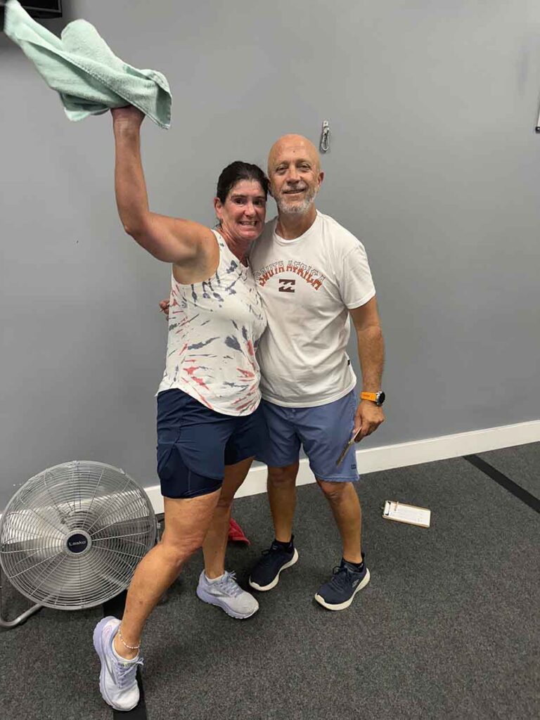 Members of Coastal Fitness posing for photo after a tough workout.