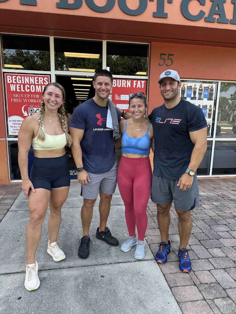 Members of Coastal Fitness posing for photo after a tough workout.