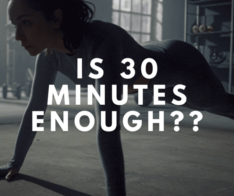 A woman doing a plank in a fitness studio